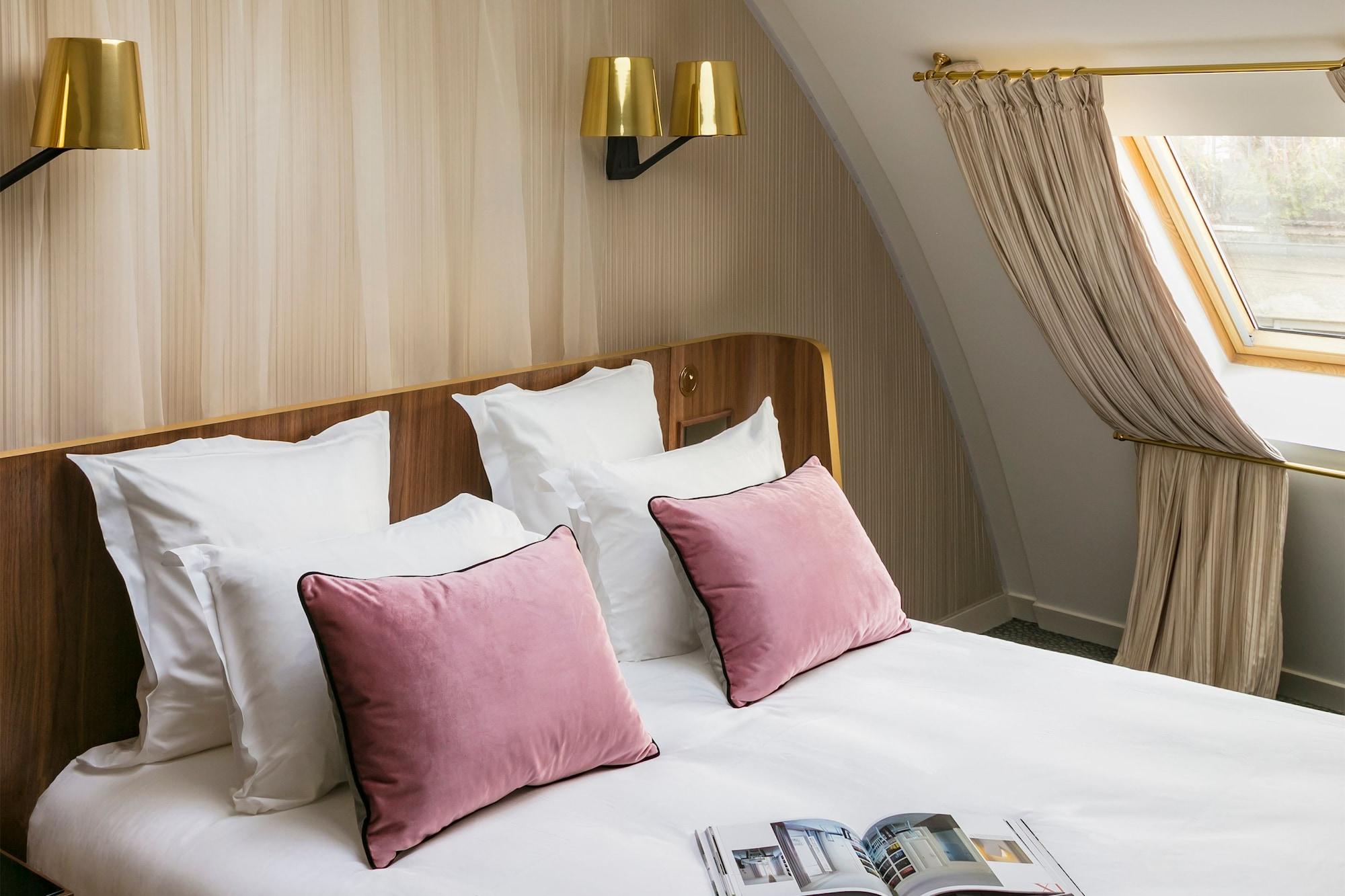 Maison Albar Hotels Le Pont-Neuf Paris Exterior foto A room at the hotel