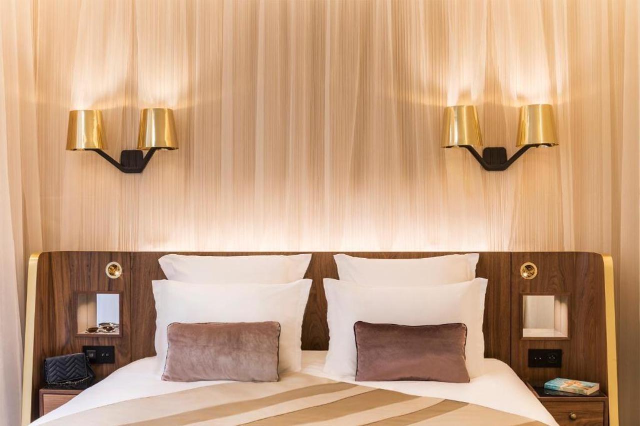 Maison Albar Hotels Le Pont-Neuf Paris Exterior foto A wall light